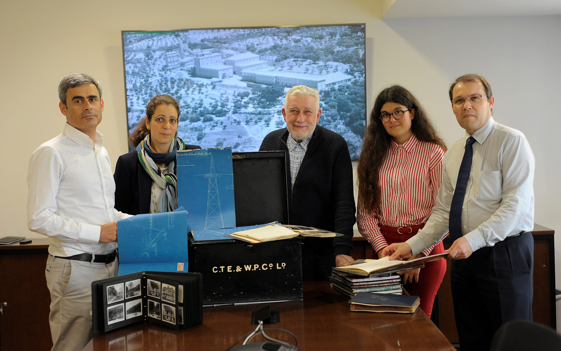 Gualter Vasco, factory manager of Caima (left) with Luis Patornilho, head of human resources at Caima (right), and the team of industrial archeologists